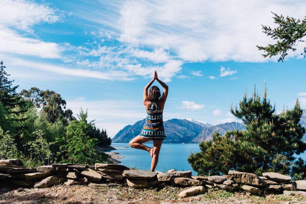 Yoga pose by Lake Hawea, NZ