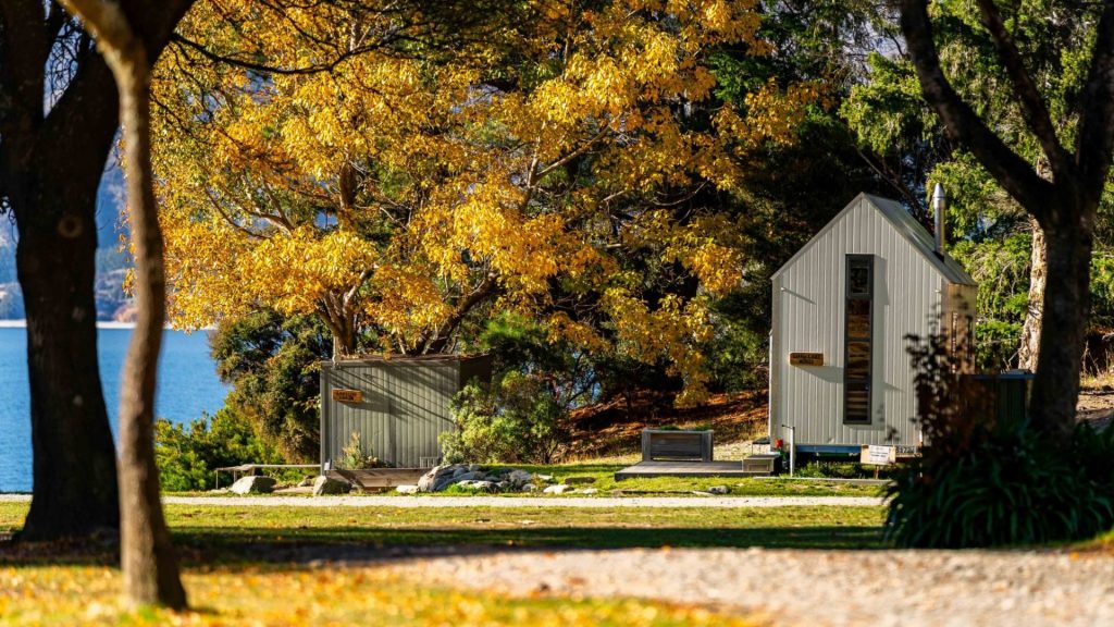 Lakeside Cabin & Little Lake House in autumn at The Camp Lake Hawea